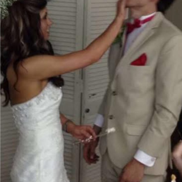 David's Bridal Lace Strapless Wedding Gown in the color “Ivory”. - Picture 8 of 16